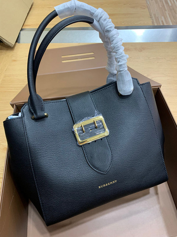 Ziva's Charm handbag – side angle view (one versatile size)