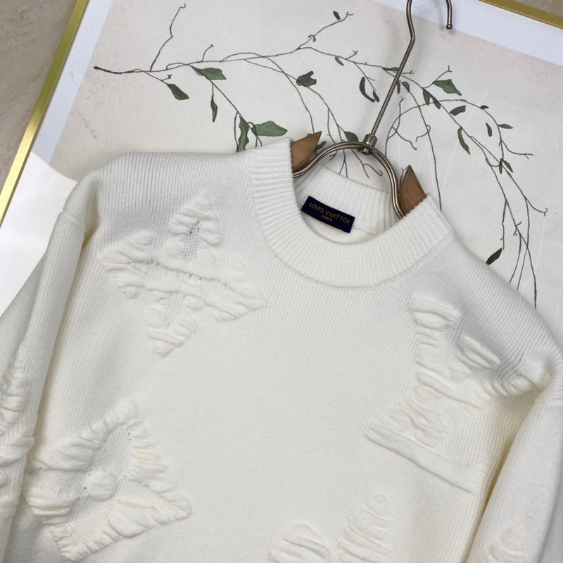 Close-up detail shot of Louis Vuitton luxury clothing with relaxed-fit cut