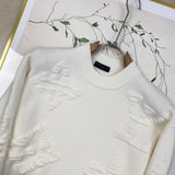 Close-up detail shot of Louis Vuitton luxury clothing with relaxed-fit cut