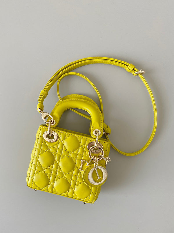 Handle and strap detail of structured signature women's handbag – women's designer-style accessory