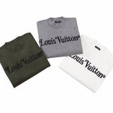 Back view of Louis Vuitton luxury clothing with label-forward styling