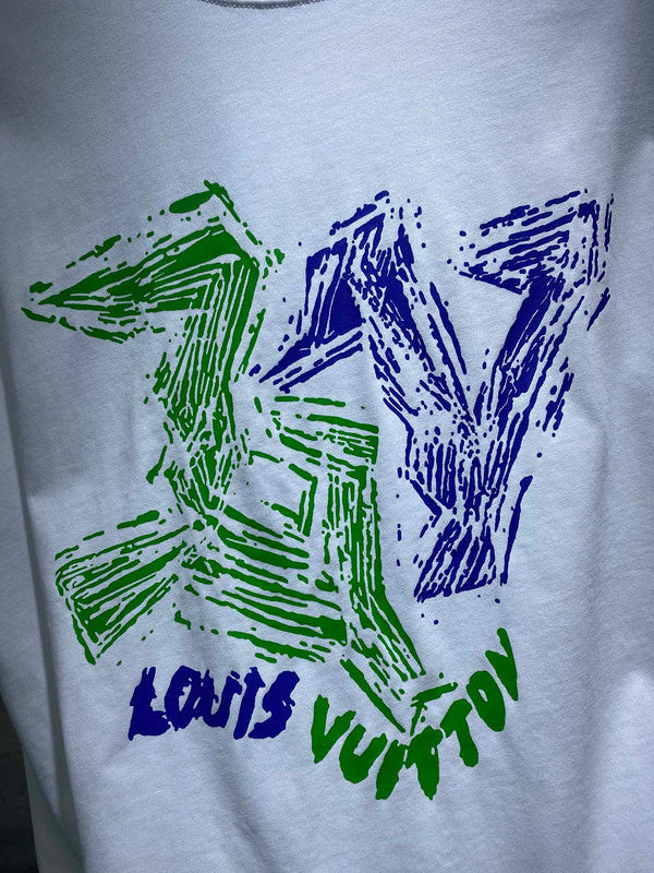 Flat lay presentation of Louis Vuitton cotton t-shirt with runway-inspired design