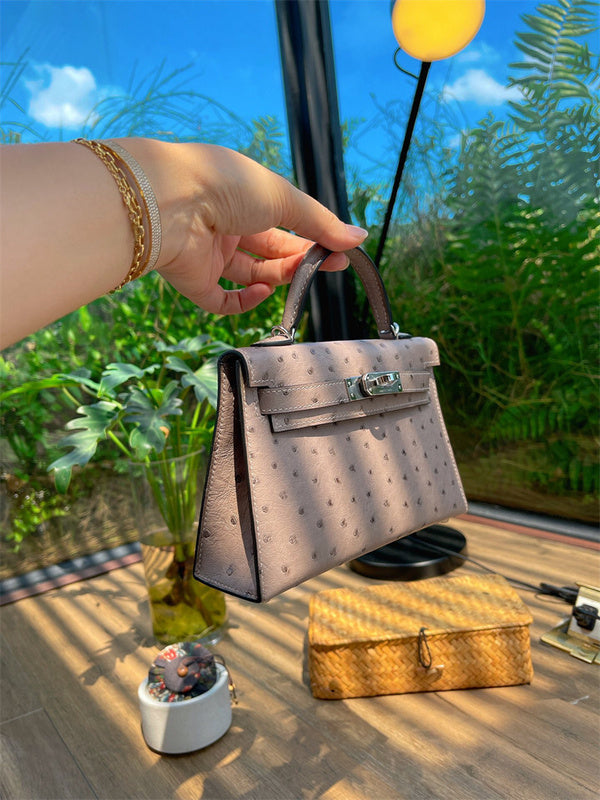  Elegant top-handle bag carried on shoulder 10