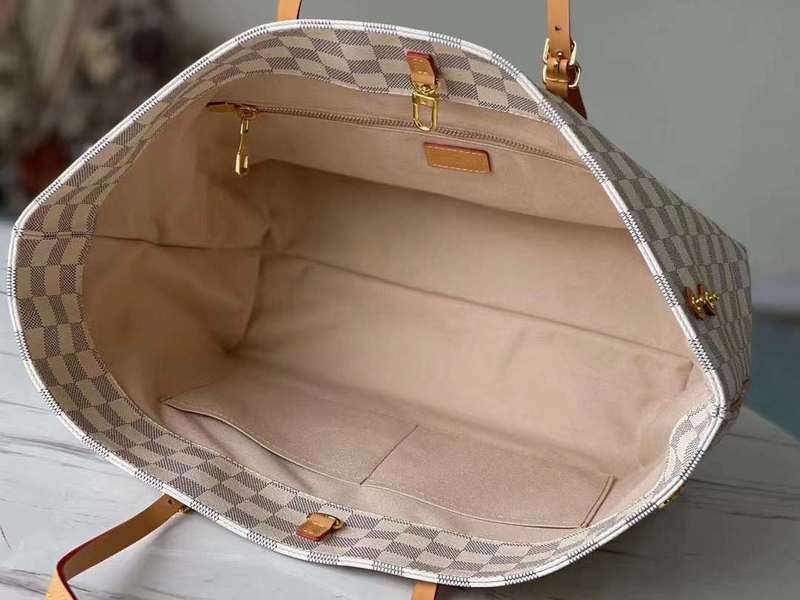 Front view of polished elevated women's handbag – women's luxury handbag