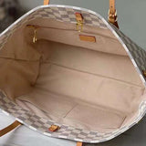 Front view of polished elevated women's handbag – women's luxury handbag