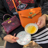  graceful structured bag detail view showing craftsmanship