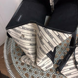 Styled lifestyle shot of chic classic women's handbag – women's designer-style accessory