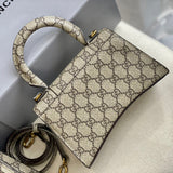 Ziva's Charm handbag – carry view (one versatile size)