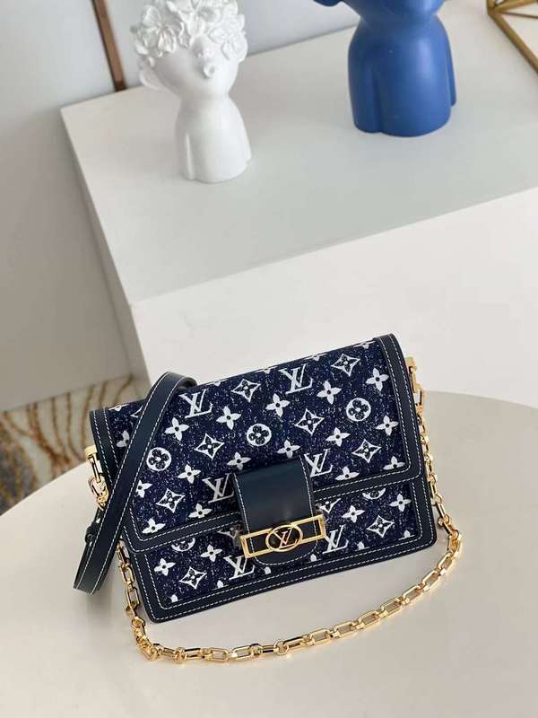 Handle and strap detail of everyday-luxe structured women's handbag – women's statement bag