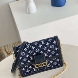 Handle and strap detail of everyday-luxe structured women's handbag – women's statement bag