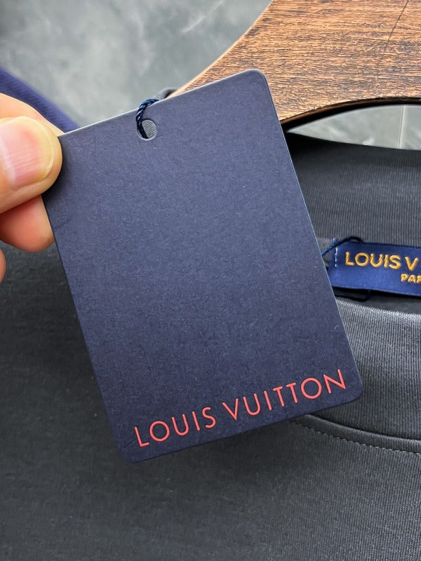 Close-up detail shot of Louis Vuitton luxury clothing with streetwear-inspired cut