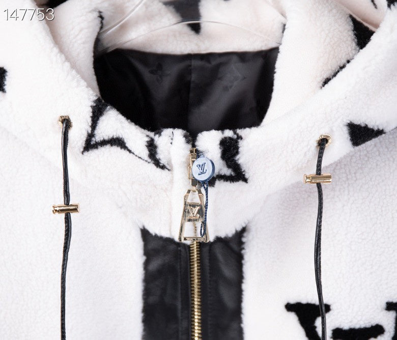 Side profile of Louis Vuitton luxury clothing with signature branding