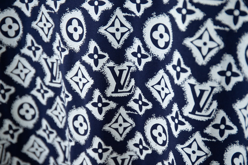 Flat lay presentation of Louis Vuitton cotton t-shirt with monogram-inspired silhouette