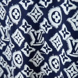 Flat lay presentation of Louis Vuitton cotton t-shirt with monogram-inspired silhouette