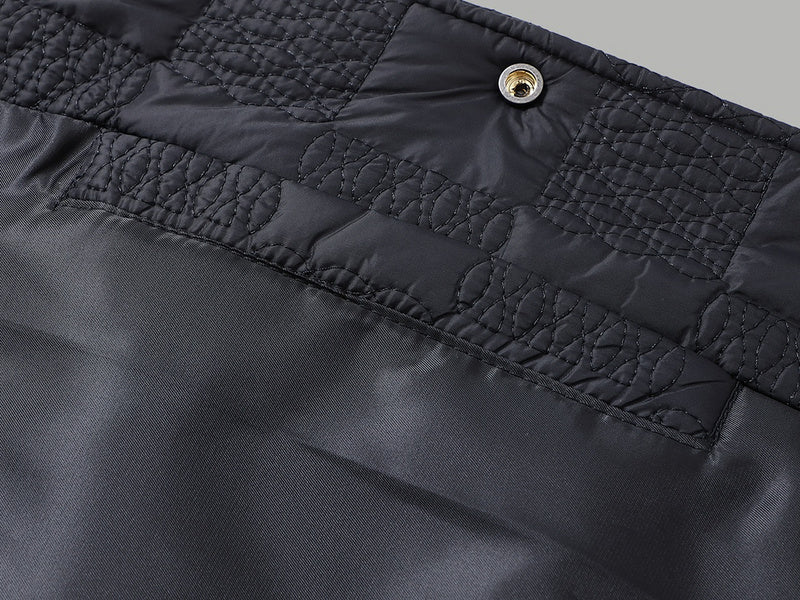 Side profile of Louis Vuitton luxury clothing with monogram-inspired silhouette