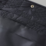 Side profile of Louis Vuitton luxury clothing with monogram-inspired silhouette