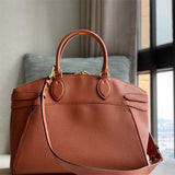  Polished top-handle bag carried on shoulder 22