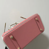 Side view of considered structured handbag