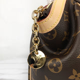 Handle and strap detail of chic everyday-luxe women's handbag – women's designer-style accessory