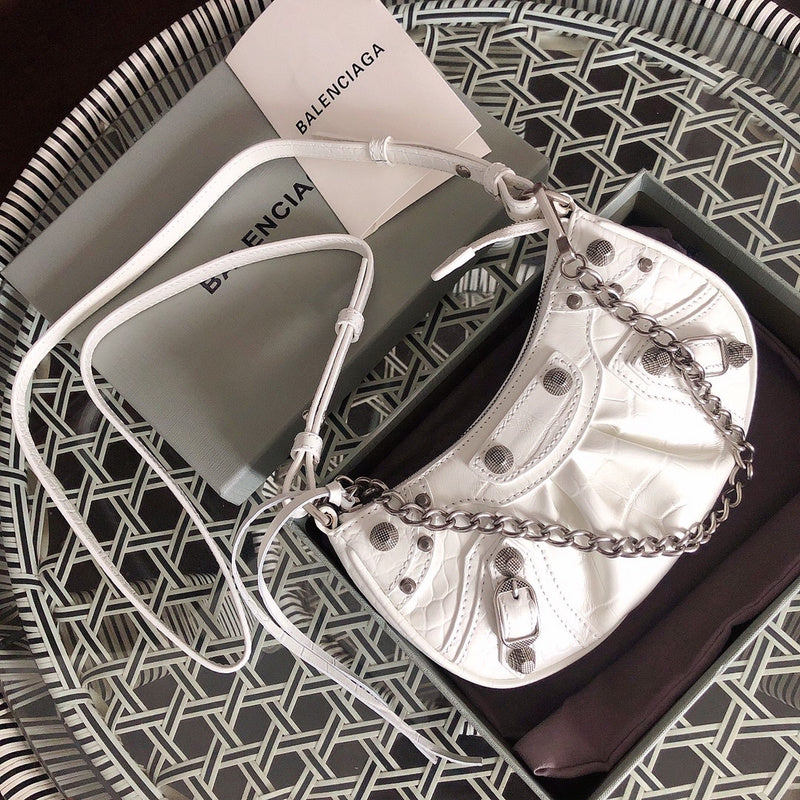 Styled lifestyle shot of elevated chic women's handbag – women's luxury accessory