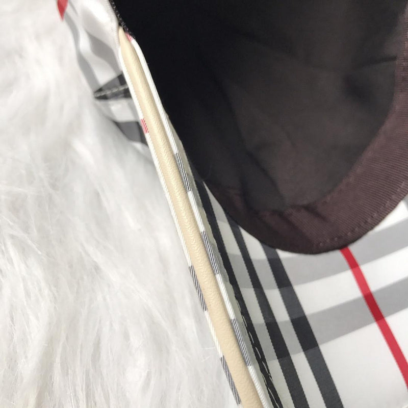 Side view of Burberry unisex cap