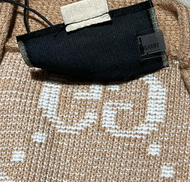Front view of Gucci luxury clothing with monogram-inspired silhouette