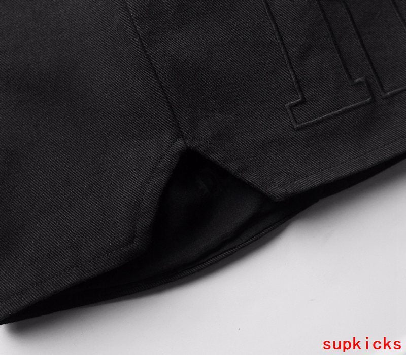Close-up detail shot of Rhude luxury clothing with everyday silhouette