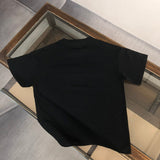 Close-up detail shot of Givenchy luxury clothing with relaxed-fit cut