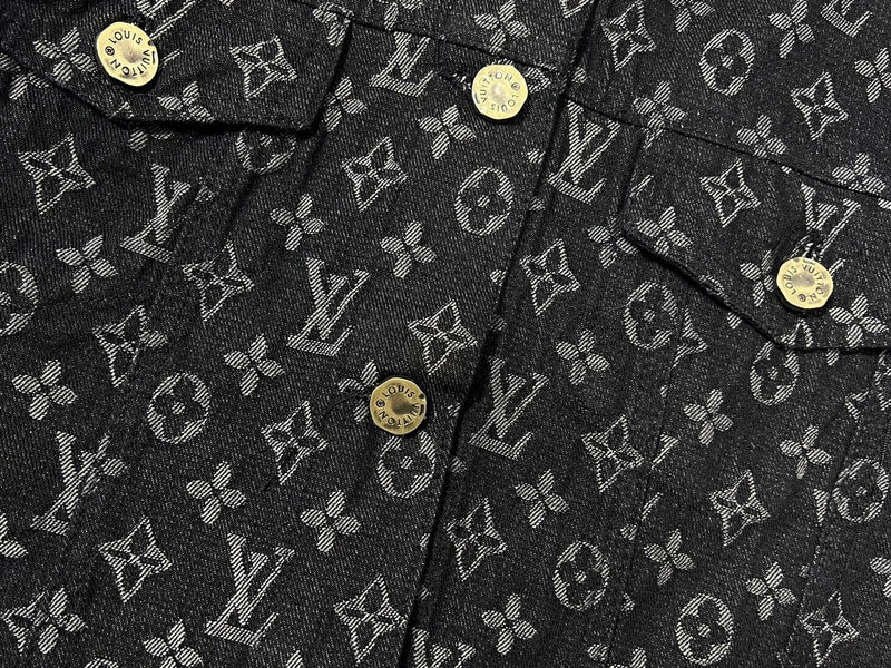 Close-up detail shot of Louis Vuitton luxury clothing with signature branding