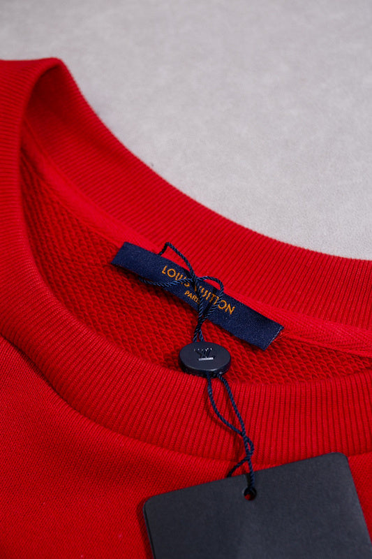 Front view of Louis Vuitton luxury clothing with logo-detail design