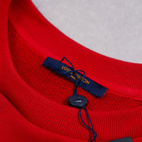 Front view of Louis Vuitton luxury clothing with logo-detail design