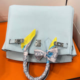Side view of modernist structured handbag
