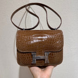  Understated structured bag carried on shoulder 16