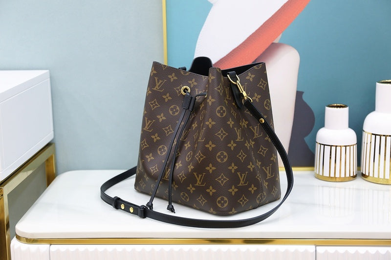 Handle and strap detail of classic refined women's handbag – women's statement bag