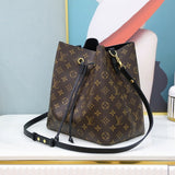 Handle and strap detail of classic refined women's handbag – women's statement bag