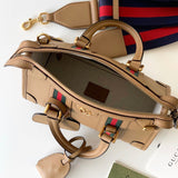 Back view of statement polished women's handbag – women's everyday handbag