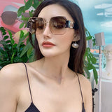 Angled view of Louis Vuitton unisex sunglasses