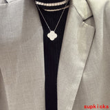 Front view of Van Cleef & Arpels unisex jewelry piece