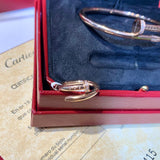 Front view of Cartier unisex jewelry piece