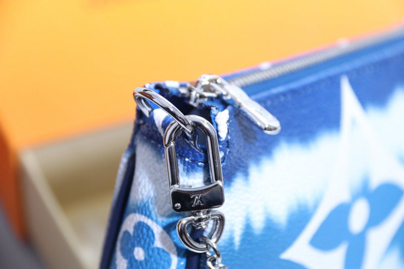 Handle and strap detail of chic polished women's handbag – women's luxury accessory