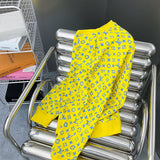 Close-up detail shot of Louis Vuitton luxury clothing with everyday silhouette