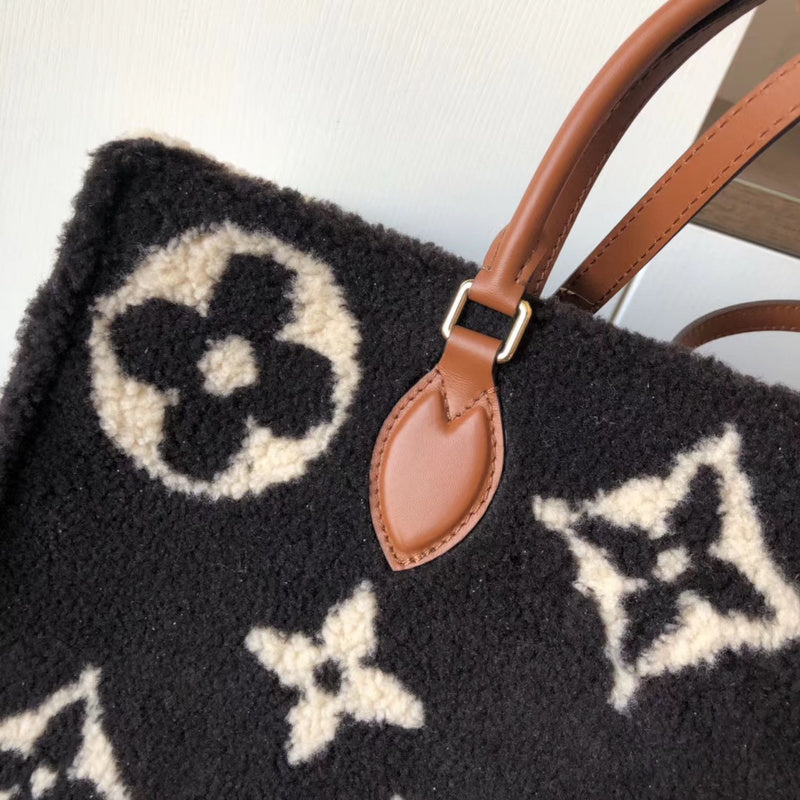 Styled lifestyle shot of classic sleek women's handbag – women's everyday handbag