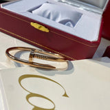 Angled view of Cartier unisex jewelry piece