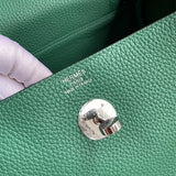 Side view of polished structured handbag