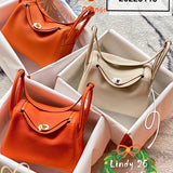 Side view of effortless structured handbag