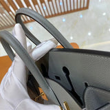 Side view of balanced structured handbag