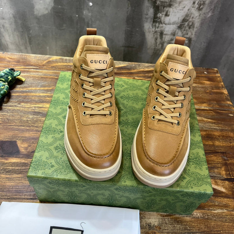 Gucci crisp white luxury sneakers view 5 retro runner design