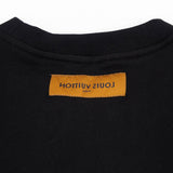 Close-up detail shot of Louis Vuitton luxury clothing with relaxed-fit cut