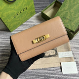 Front view of polished signature women's handbag – women's designer-style accessory