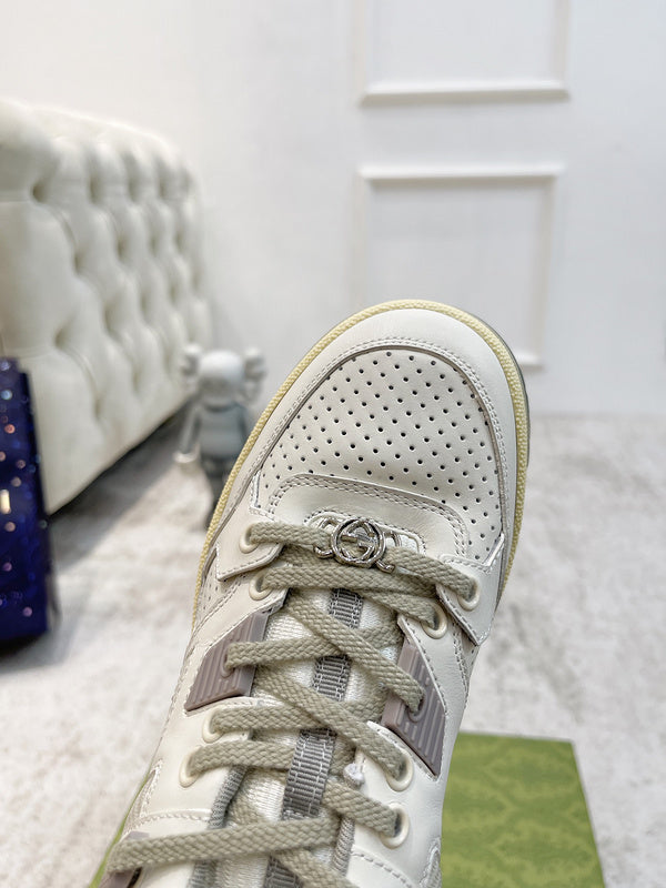 Side profile of Gucci classic monochrome sneakers low-top design